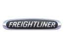 Freightliner logo featuring the brand name in silver capital letters on a black, oval background with a metallic border.